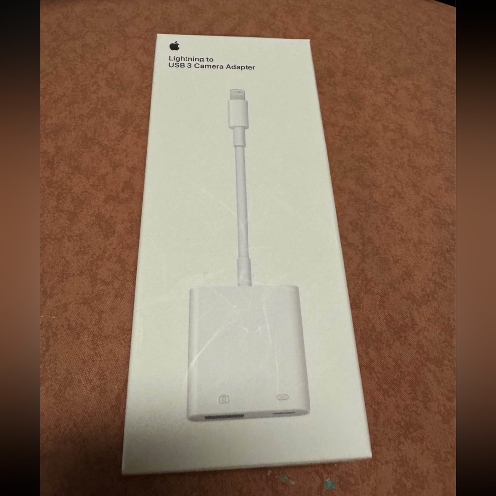 APPLE Lightning to UsB 3 camera adapter 
Brand new